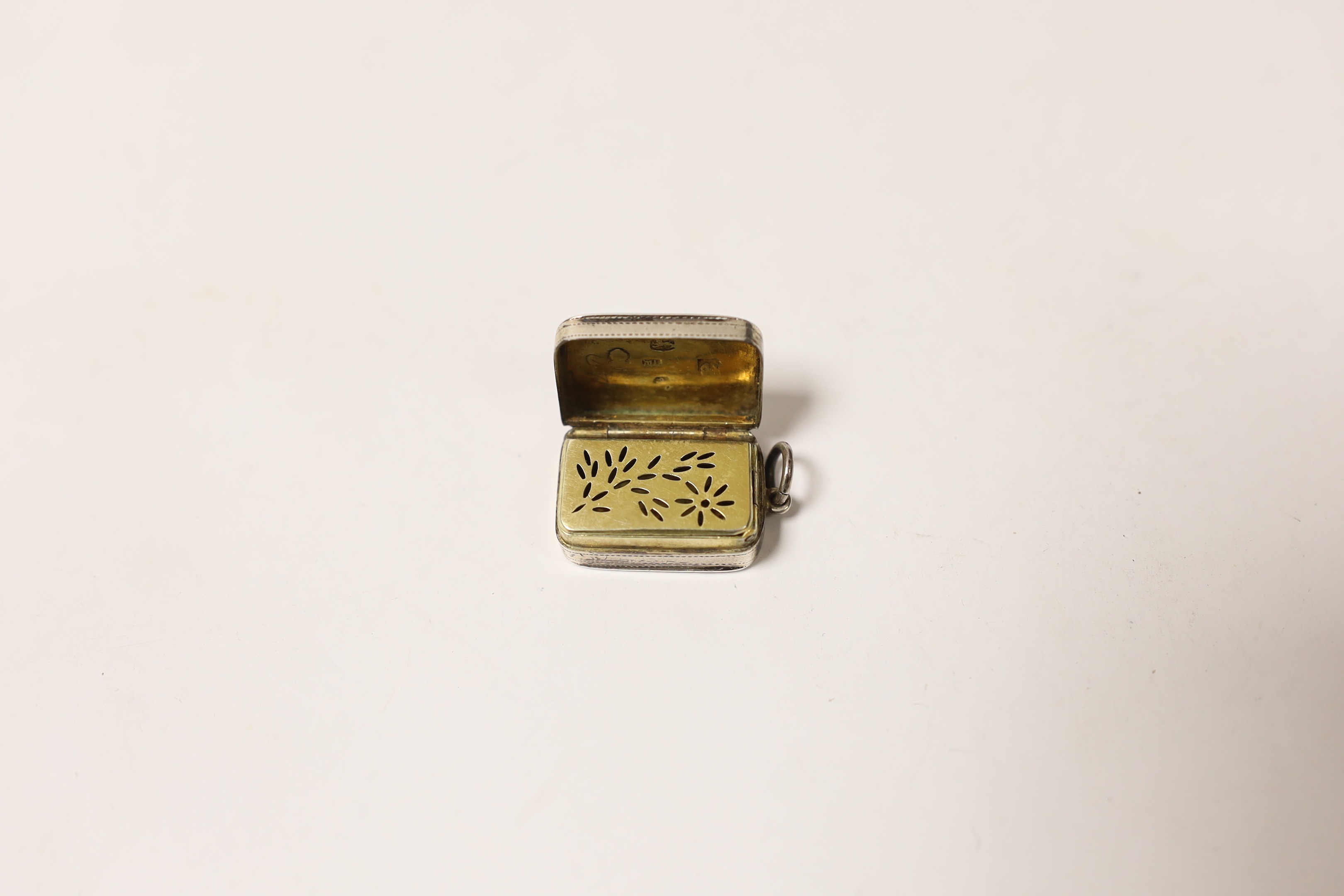 A George III engraved silver vinaigrette, Matthew Linwood, Birmingham, 1802, 23mm.